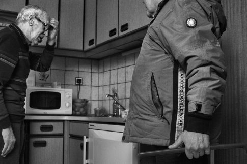 Silent Heroes Dad in Kitchen - Documentary Photographer